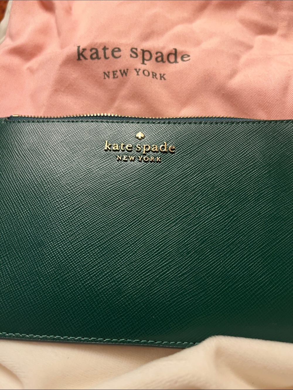 Kate Spade Staci Medium Slim Wristlet with gold accents.  NEW with dust bag.